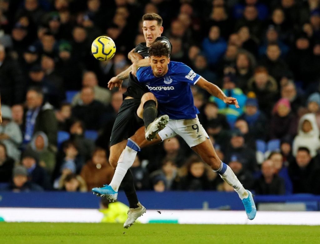 Brighton & Hove Albion's Lewis Dunk in action with Everton's Dominic Calvert-Lewin