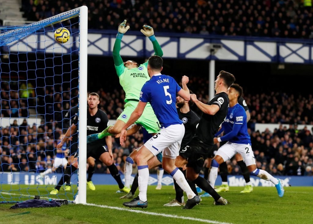 Everton's Michael Keane shoots against the crossbar v Brighton & Hove Albion