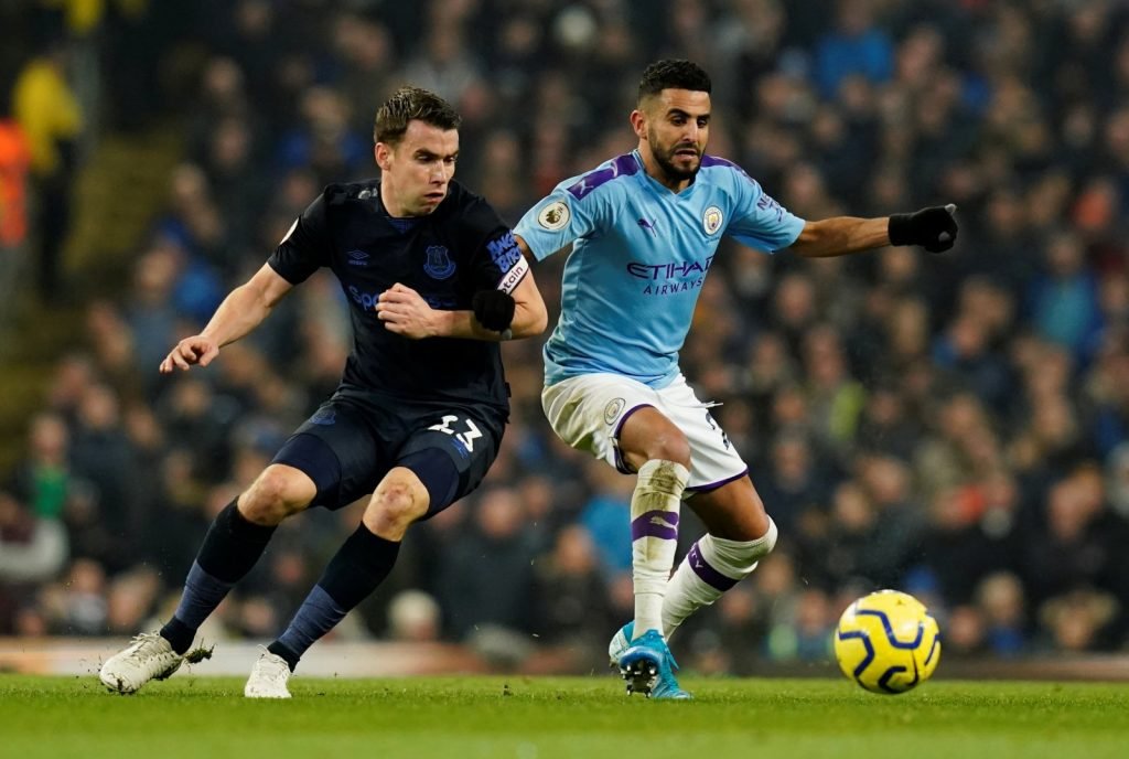 Everton's Seamus Coleman in action with Manchester City's Riyad Mahrez
