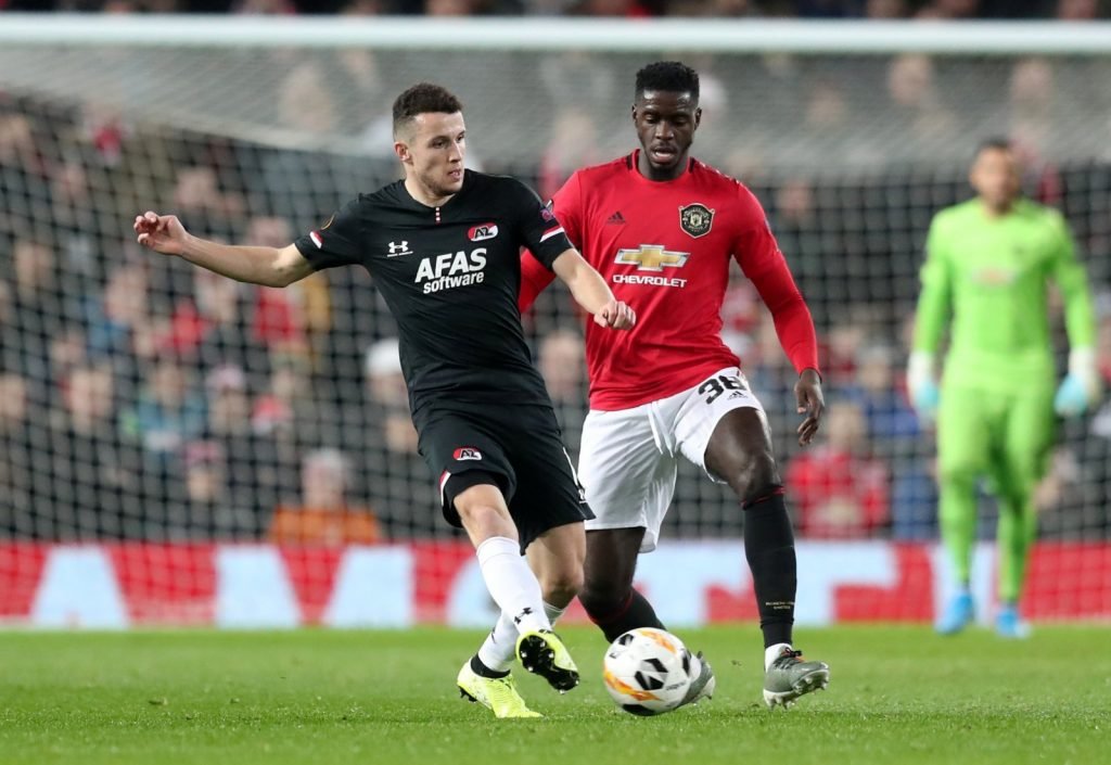Manchester United's Axel Tuanzebe in action with AZ Alkmaar's Oussama Idrissi