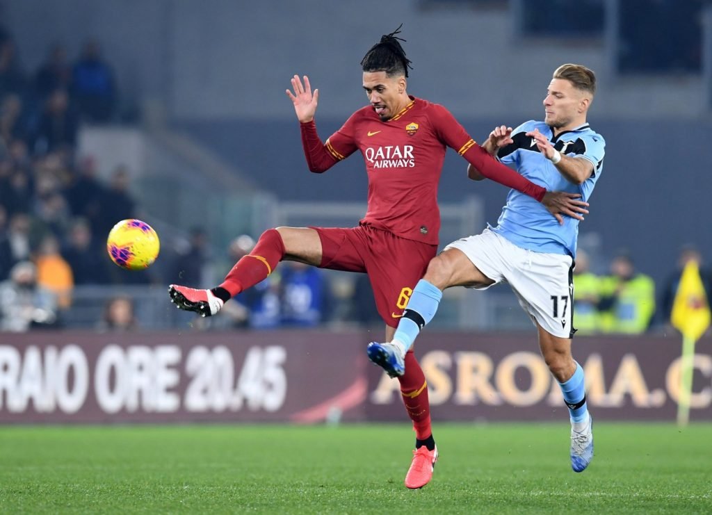 AS Roma's Chris Smalling in action with Lazio's Ciro Immobile
