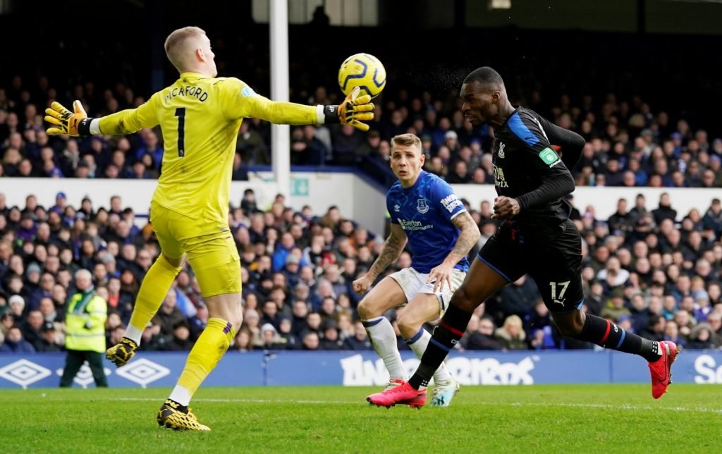 Everton's Jordan Pickford saves a shot from Crystal Palace's Christian Benteke