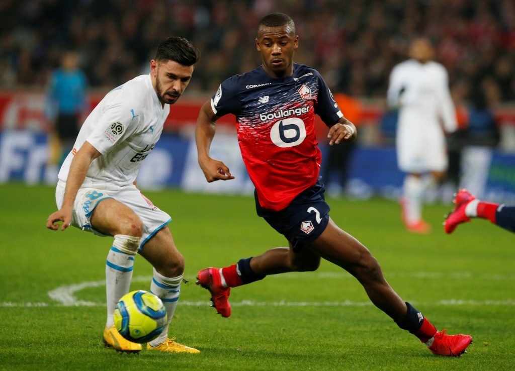 Olympique de Marseille's Morgan Sanson in action with Lille's Tiago Djalo
