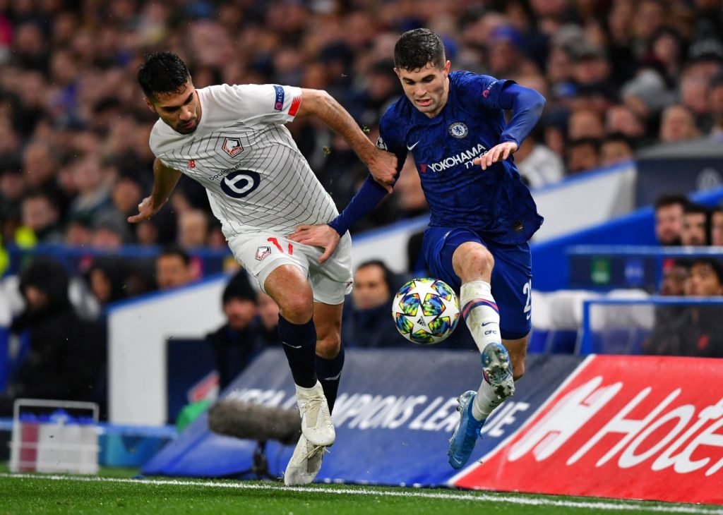 Chelsea's Christian Pulisic in action with Lille's Zeki Celik