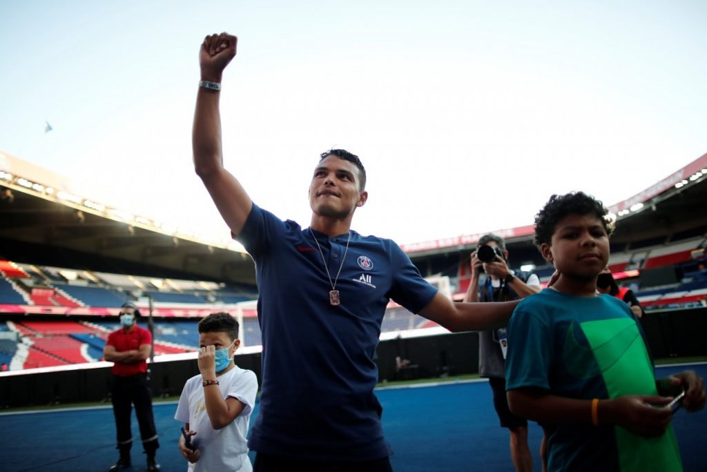Paris St Germain's Thiago Silva acknowledges the fans after his last match at Parc des Princes