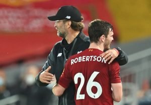 Liverpool's-Andrew-Robertson-hugs-Liverpool-manager-Jurgen-Klopp-as-he-is-substituted-off