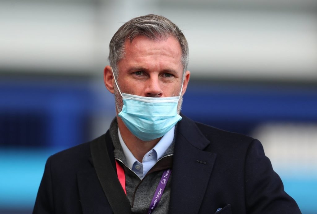 Pundit-Jamie-Carragher-wears-a-mask-before-the-match