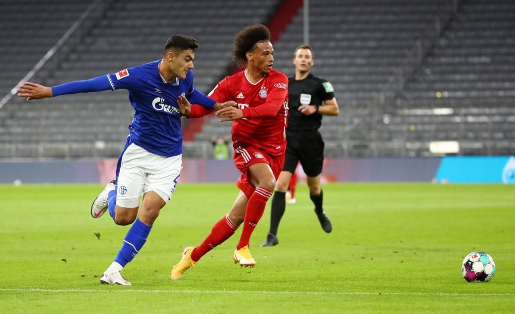 Bayern Munich's Leroy Sane in action with Schalke 04's Ozan Kabak