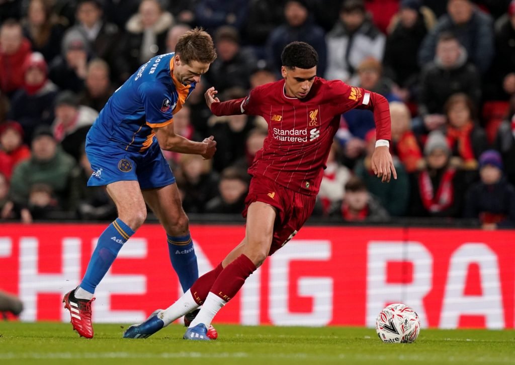 Shrewsbury Town's David Edwards in action with Liverpool's Ki-Jana Hoever