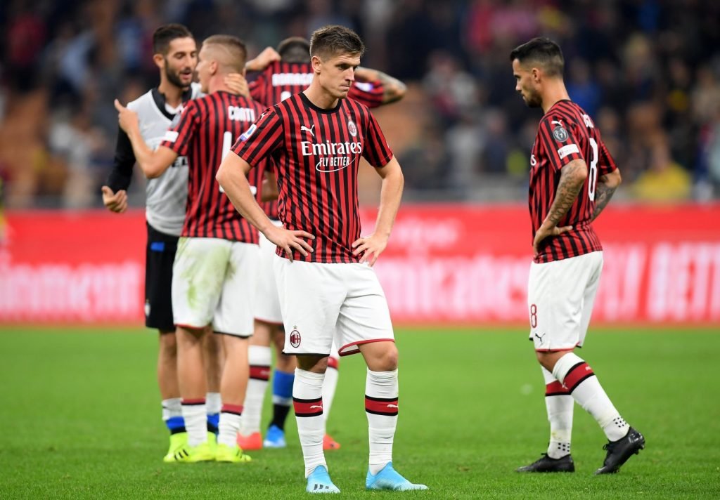 AC Milan's Krzysztof Piatek looks dejected after the Inter Milan match