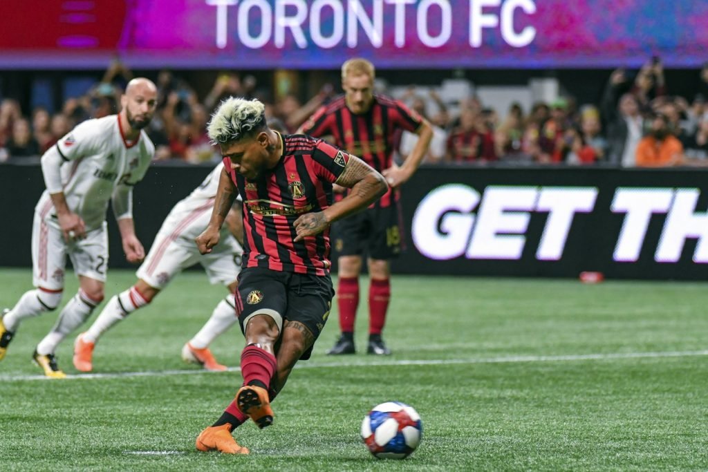 Atlanta United forward Josef Martinez (7) attempts a penalty kick against Toronto FC