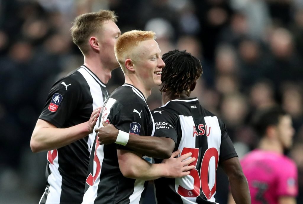Newcastle United's Matthew Longstaff celebrates scoring their second goal v Rochdale in FA Cup Third Round Replay with teammates