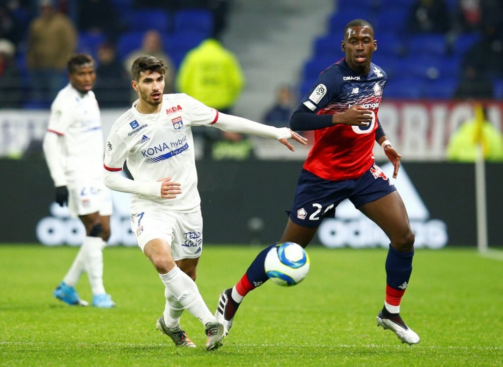 Olympique Lyonnais' Martin Terrier in action with Lille's Boubakary Soumare