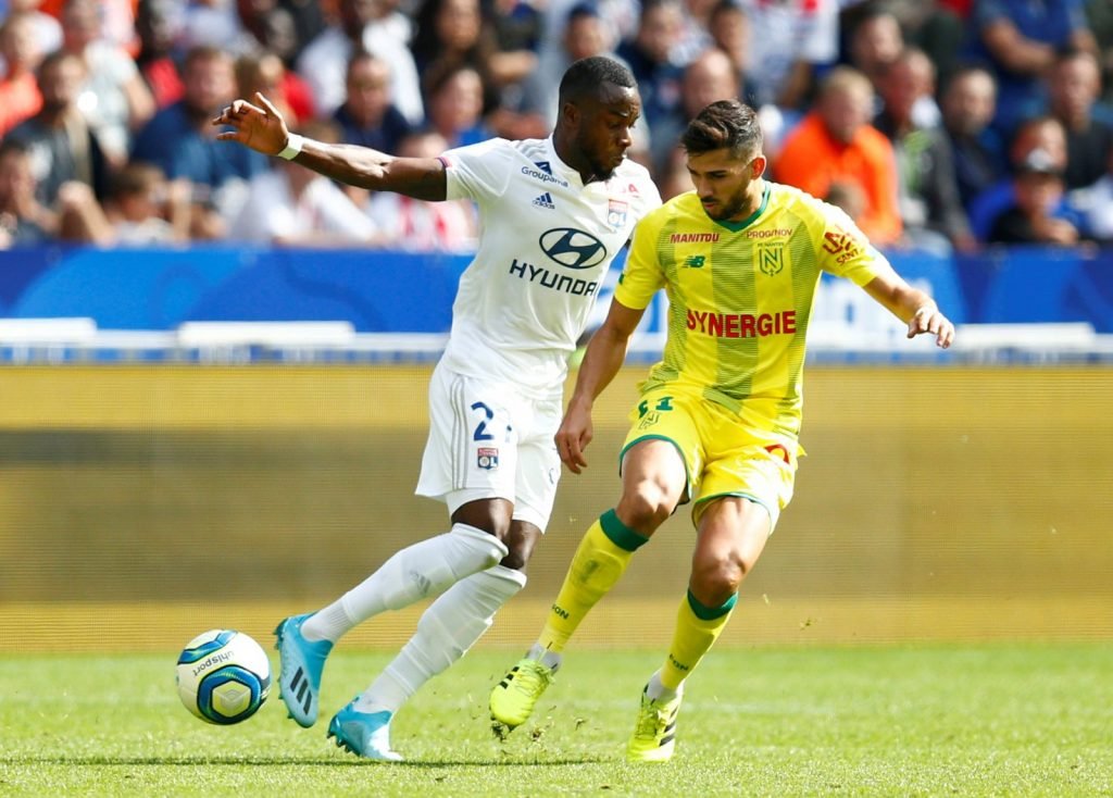 Olympique Lyonnais' Maxwel Cornet in action with Nantes' Mehdi Abeid