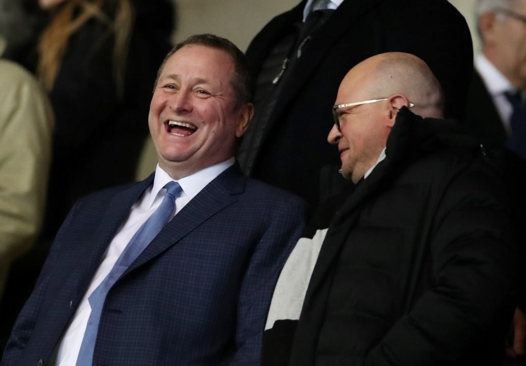 Newcastle United owner Mike Ashley and managing director Lee Charnley laugh in the stands before the FA Cup Fourth Round Replay vs Oxford United