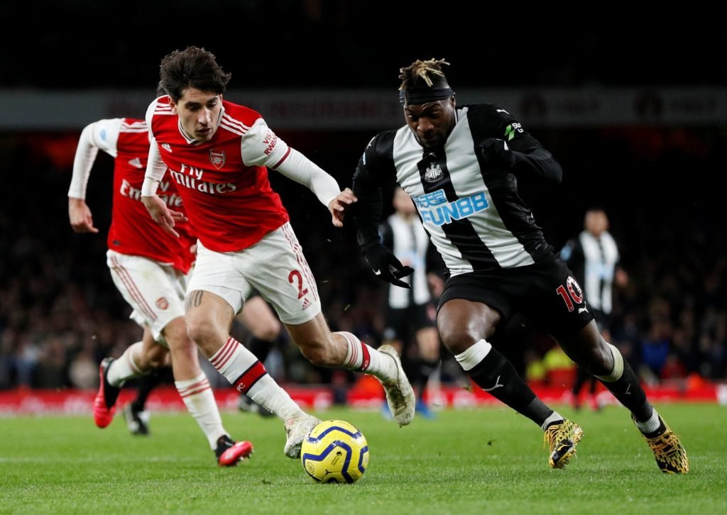 Newcastle United's Allan Saint-Maximin in action with Arsenal's Hector Bellerin