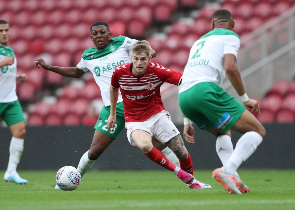 Middlesbrough's Hayden Coulson in action with Saint Etienne's Zaydou Youssouf