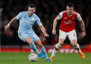 Arsenal's Granit Xhaka in action with Leeds United's Jack Harrison