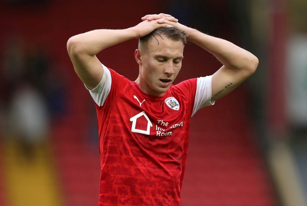 Barnsley's Cauley Woodrow looks dejected at the end of the Swansea City match