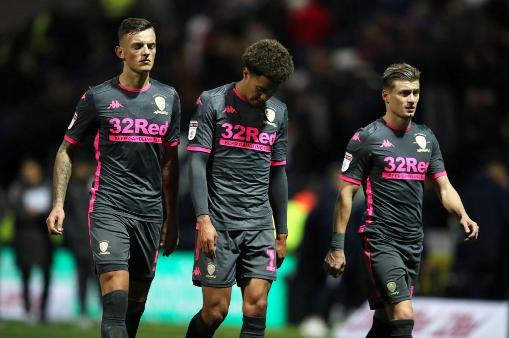Leeds United's Ben White (left), Helder Costa (centre) and Ezgjan Alioski walk off the pitch at the end of the Preston North End match