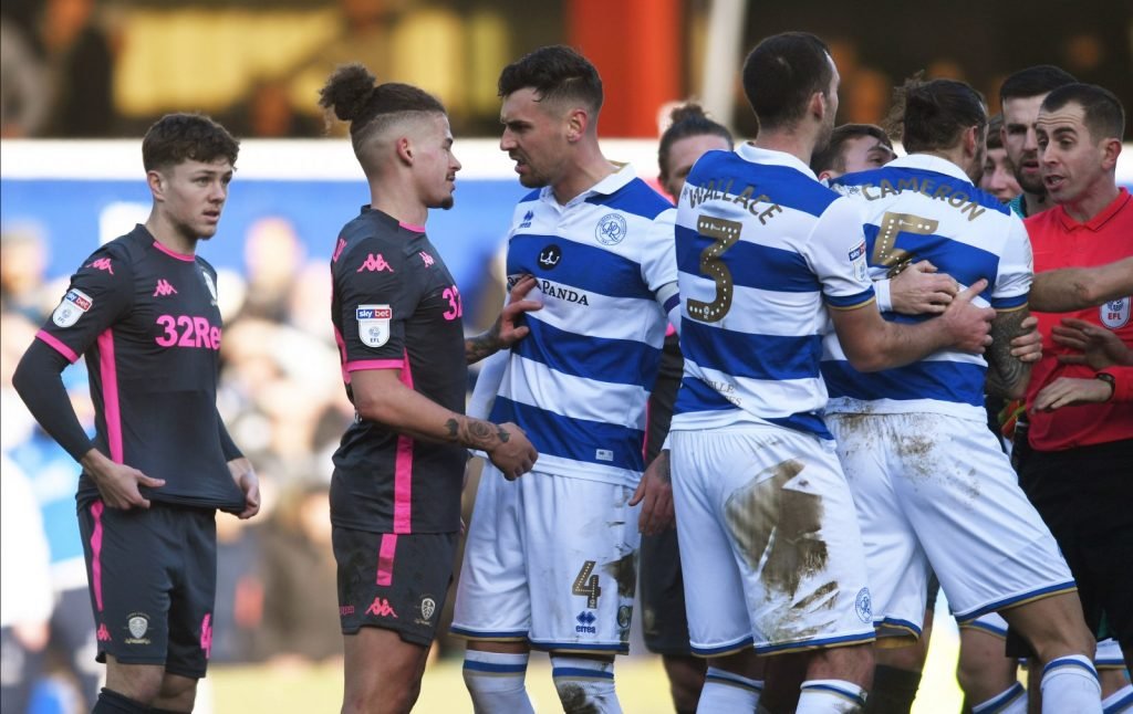 Queens Park Rangers' Grant Hall clashes with Leeds United's Kalvin Phillips before he receives a red card for a challenge on Geoff Cameron