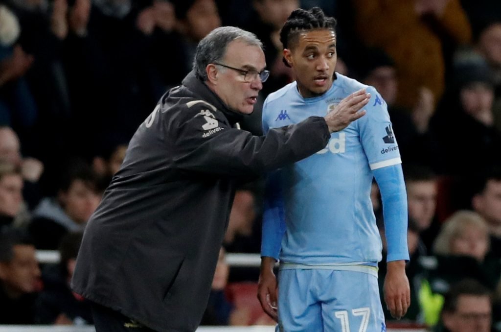Leeds United's Helder Costa with manager Marcelo Bielsa as he waits to be substituted on vs Arsenal
