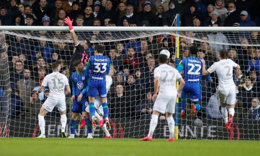 Leeds United's Pablo Hernandez (not pictured) scores an own goal and the first for Wigan Athletic