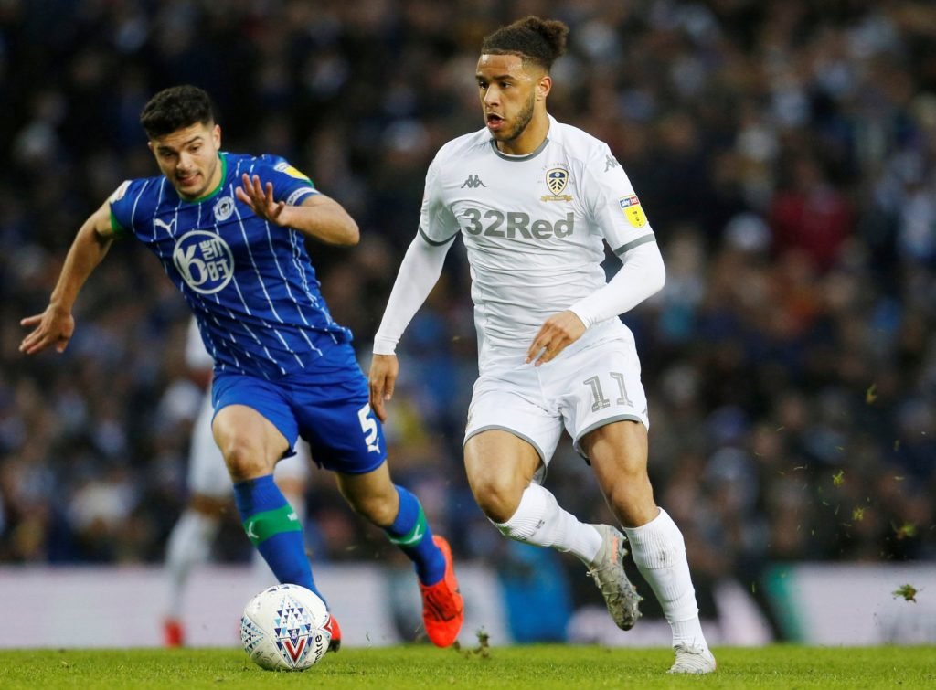 Leeds United's Tyler Roberts in action with Wigan Athletic's Sam Morsy Action