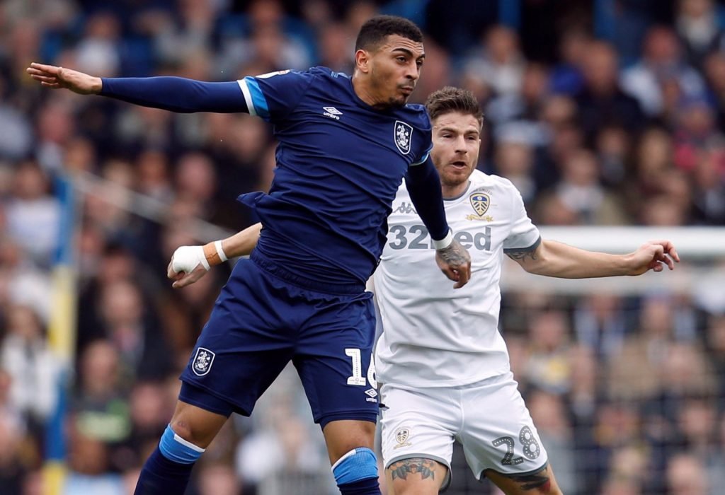 Huddersfield Town's Karlan Grant in action with Leeds United's Gaetano Berardi