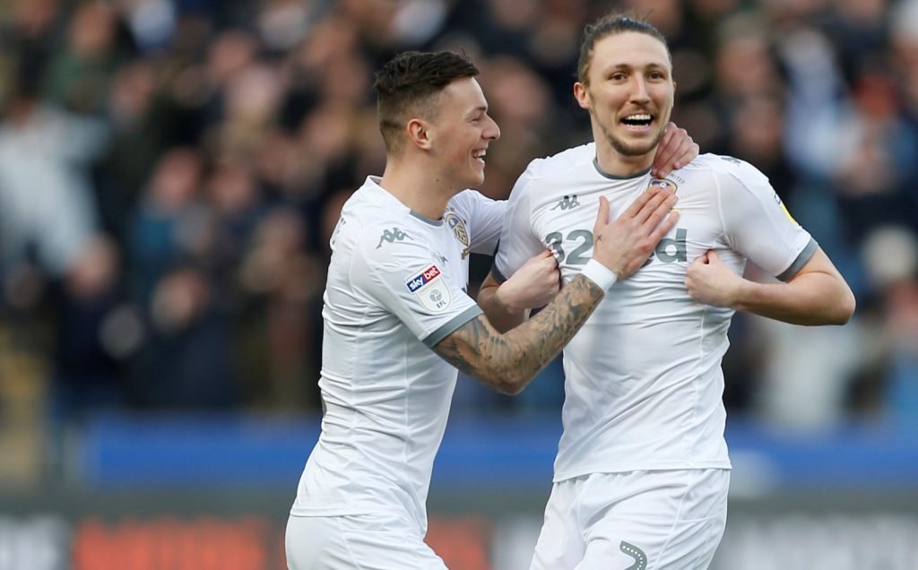 Leeds United's Luke Ayling celebrates with teammates after scoring their first goal v Huddersfield Town