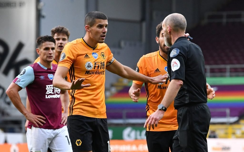 Wolverhampton Wanderers' Conor Coady appeals to referee Mike Dean
