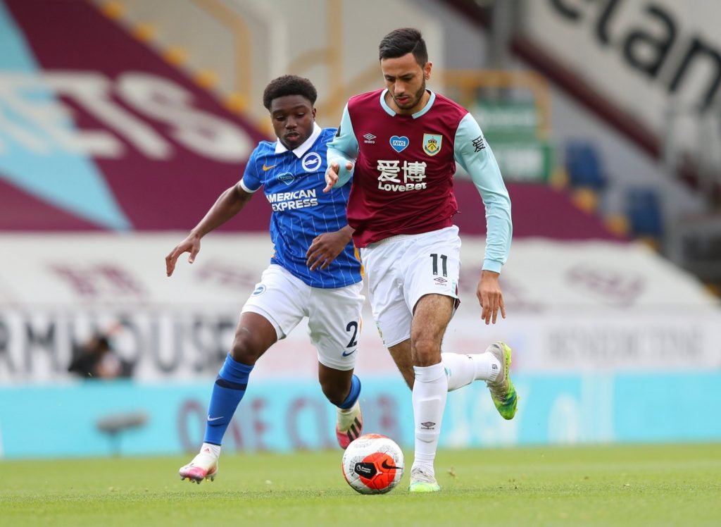 Burnley's Dwight McNeil in action with Brighton & Hove Albion's Tariq Lamptey