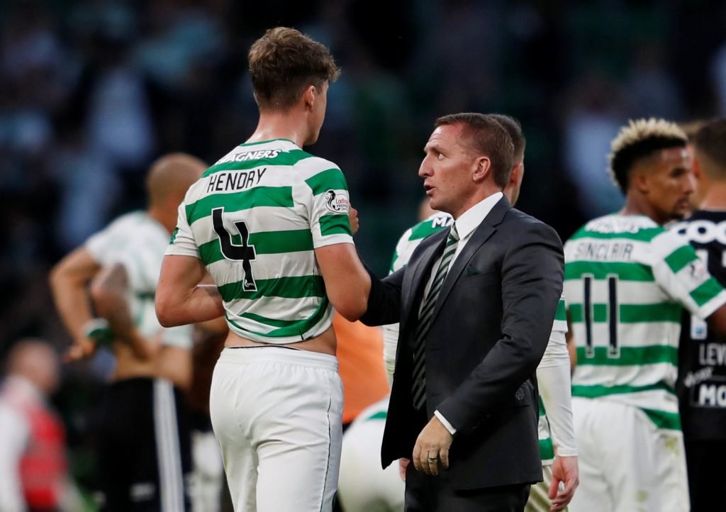 Jack Hendry speaks to Brendan Rodgers after a Celtic win