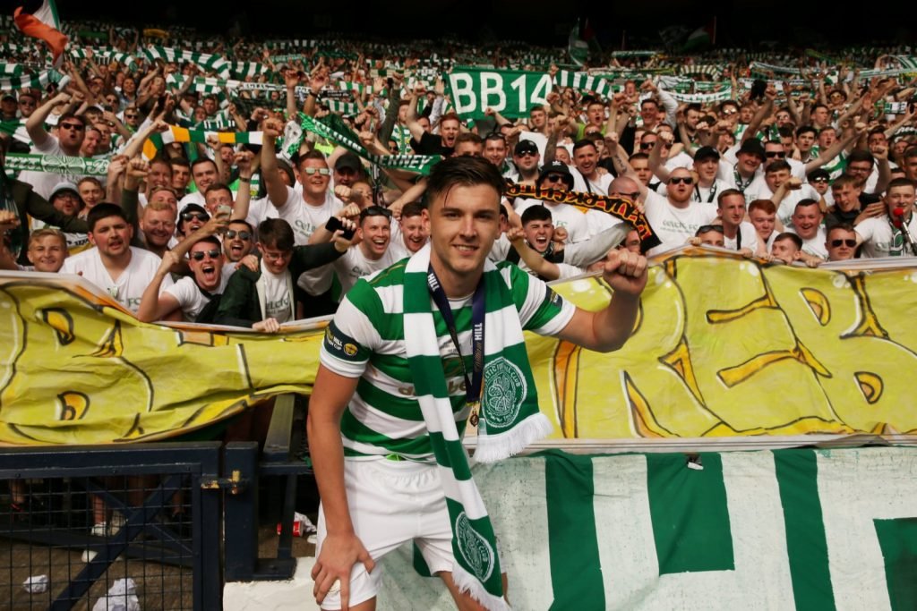 Kieran Tierney celebrates with Celtic supporters