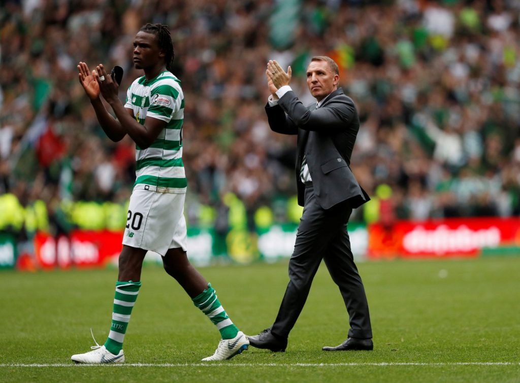 Dedryck Boyata and Brendan Rodgers after a Celtic victory