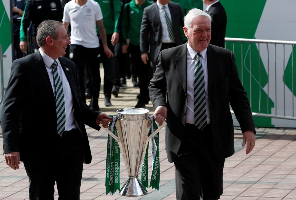 Former Celtic captain Tom Boyd with the Scottish Premiership trophy