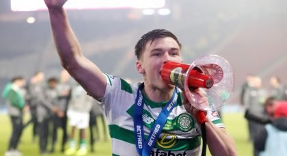 Kieran Tiernet celebrates with Celtic supporters