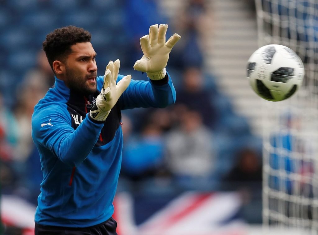 Wes Foderingham warms up ahead of a Rangers game