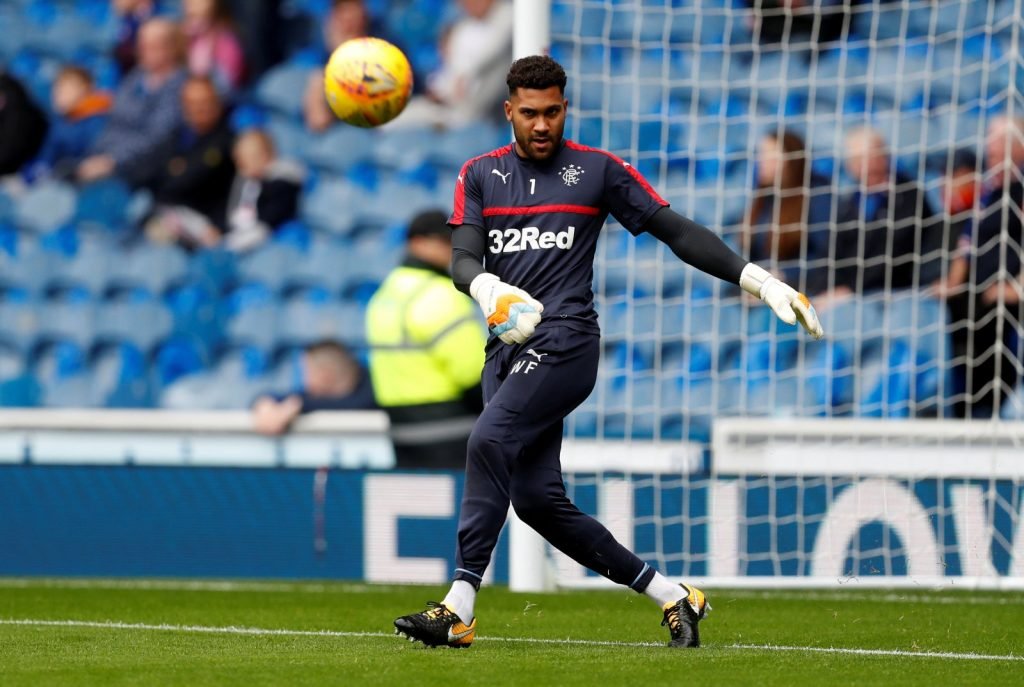 Wes Foderingham warms up ahead of a Rangers match