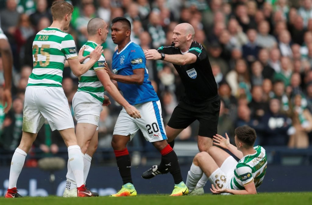 Rangers striker Alfredo Morelos clashes with Celtic captain Scott Brown