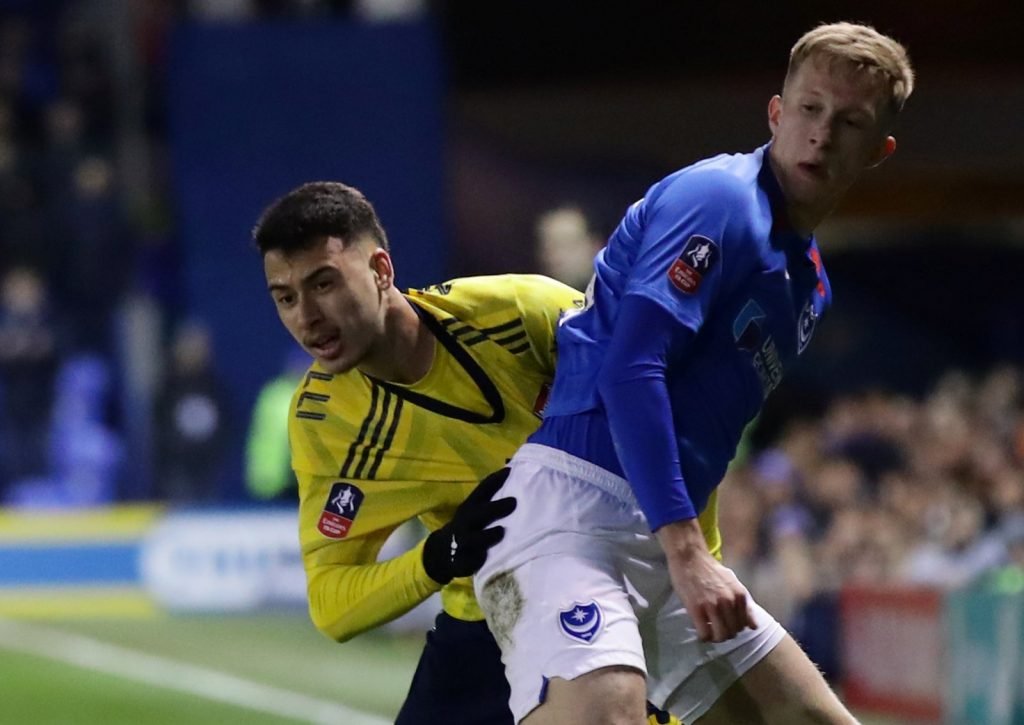 Arsenal's Gabriel Martinelli in action with Portsmouth's Ross McCrorie during FA Cup Fifth Round